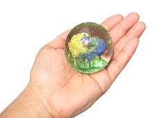 Glass Ball In Hand Royalty Free Stock Photography
