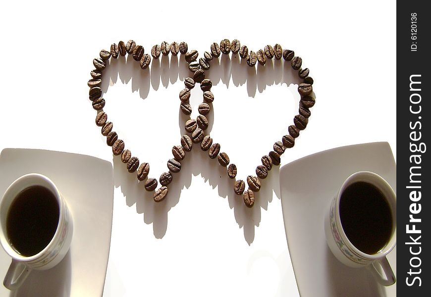 Photograph representing two cups of coffee of a couple