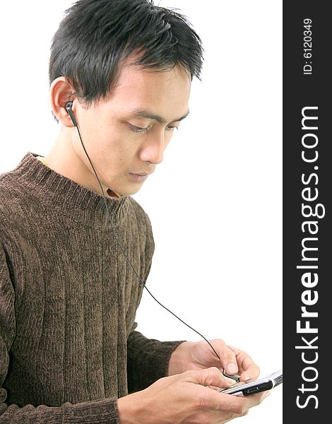 Man and cellular phone with headphone
