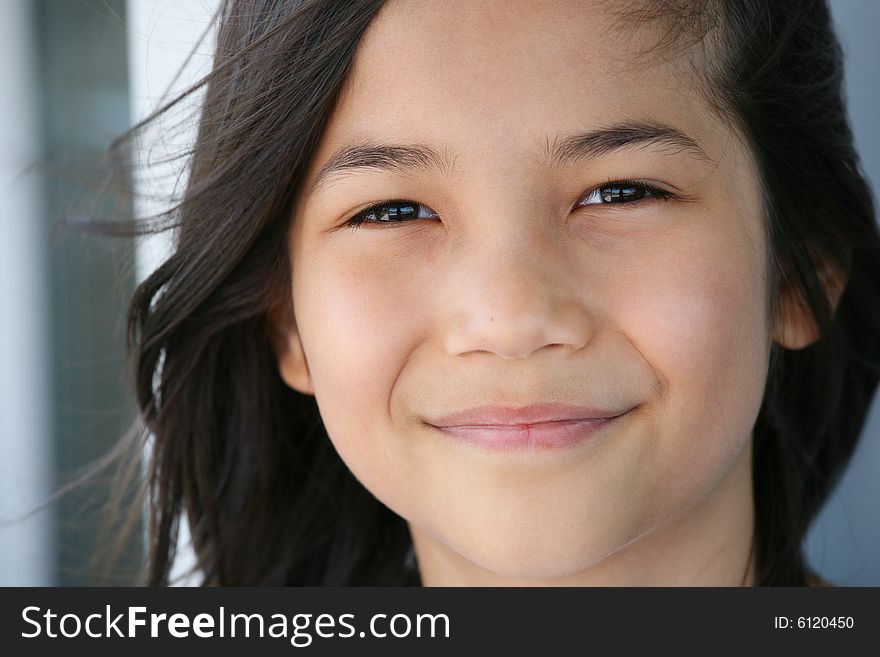 Happy little girl smiling outdoors. Happy little girl smiling outdoors