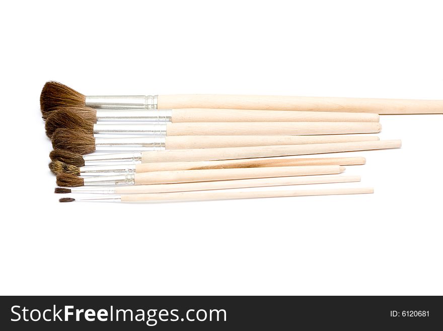 Different thickness proffesional brushes on neutral background