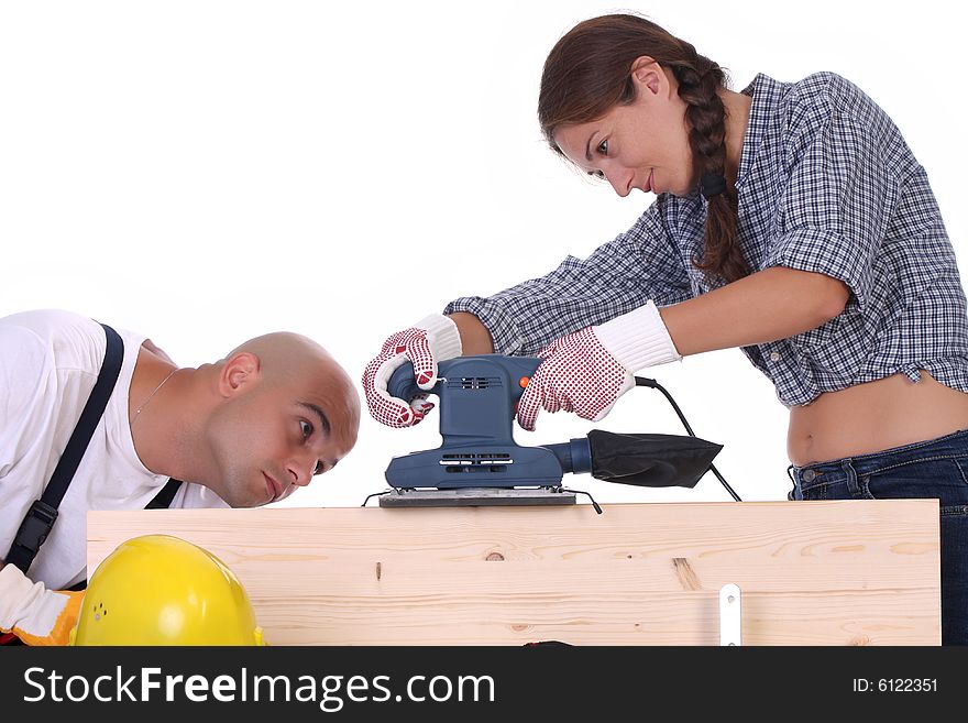 Construction workers at work on white background