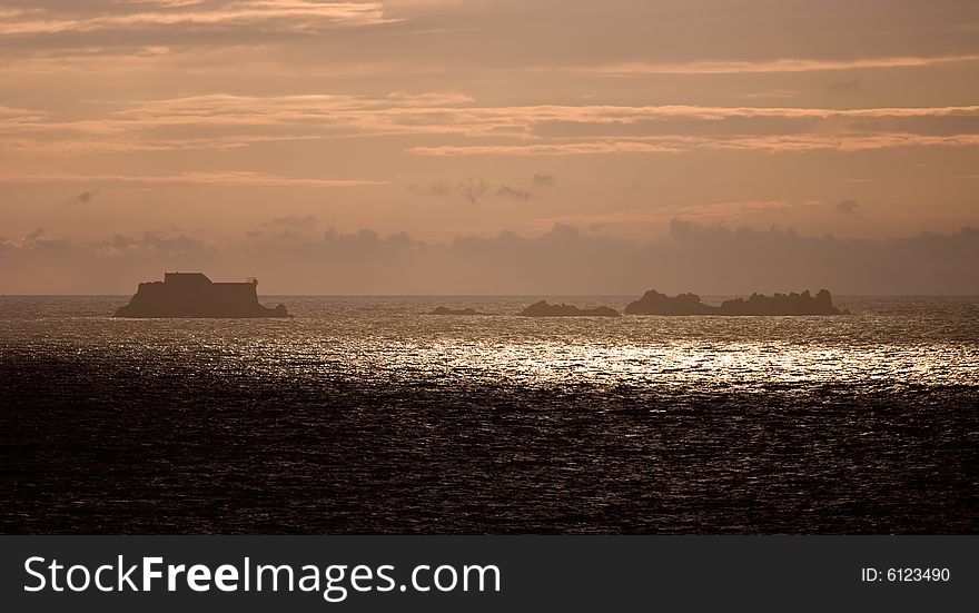 Sunset over the Brittany coast in Saint Malo, France. Sunset over the Brittany coast in Saint Malo, France