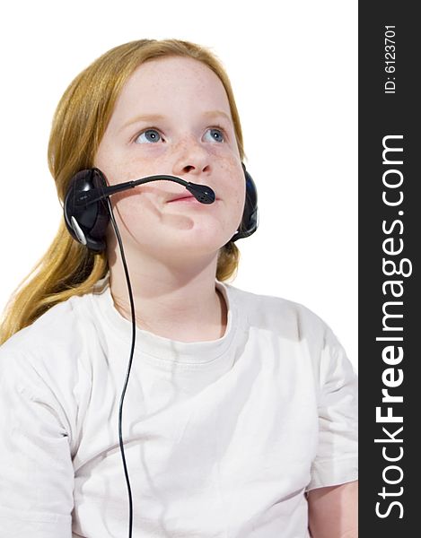 Little girl wearing headset isolated on a white background