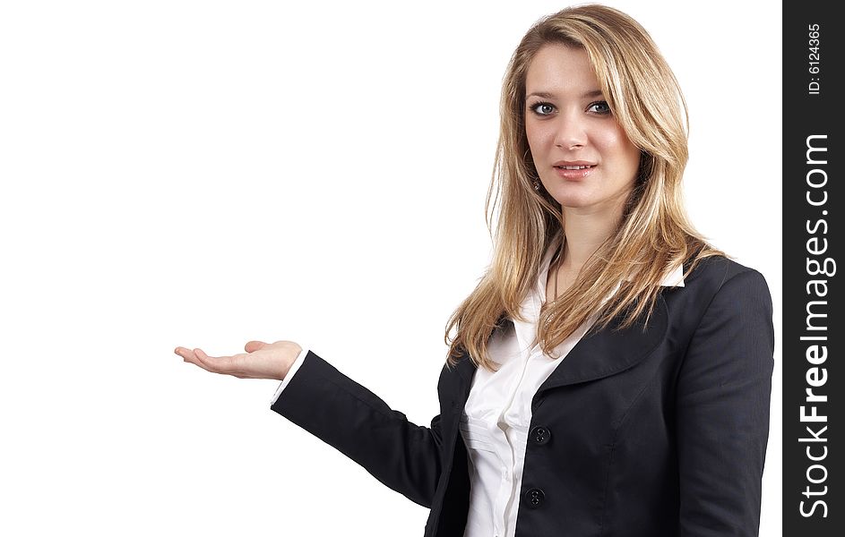 Beautiful blonde businesswoman wearing office clothes showing something with her hand. Isolated on white background