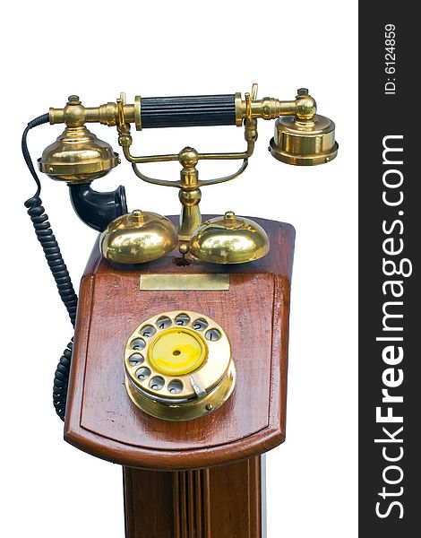 A vintage telephone on white background. A vintage telephone on white background