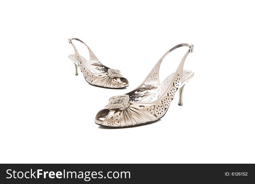Isolated lady shoes with some jewels. Isolated lady shoes with some jewels