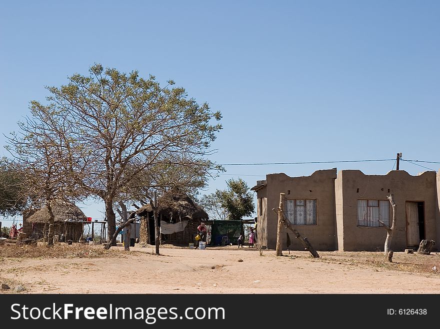 Just off the big cities of south africa there is landscape, hut in the old style of the african tribes. Just off the big cities of south africa there is landscape, hut in the old style of the african tribes