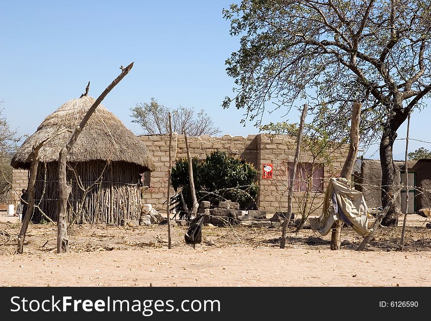 Just off the big cities of south africa there is landscape, hut in the old style of the african tribes. Just off the big cities of south africa there is landscape, hut in the old style of the african tribes