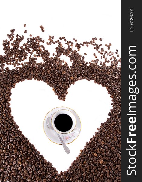 Coffee cup in the center of heart symbol. Coffee cup in the center of heart symbol