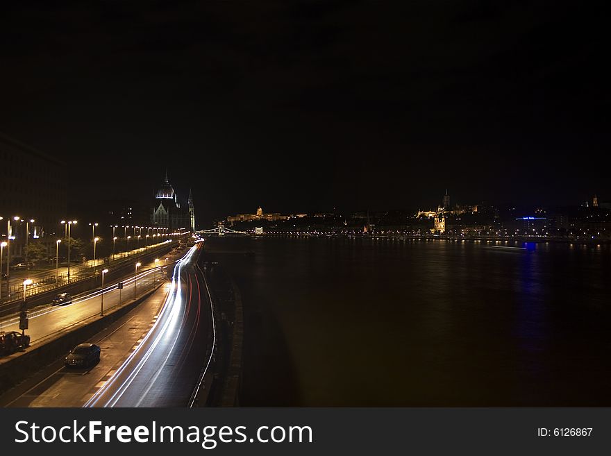 A view of the Pest bank in Budapest at night, from the Margaret Bridge. The Chain bridge is also visible. A view of the Pest bank in Budapest at night, from the Margaret Bridge. The Chain bridge is also visible