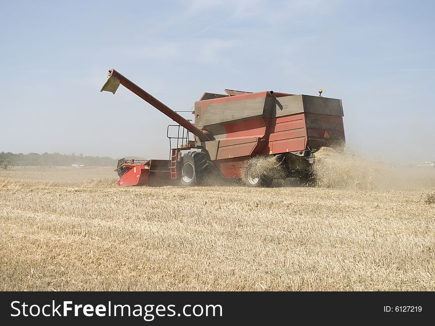 Grain harvester a hot summer day