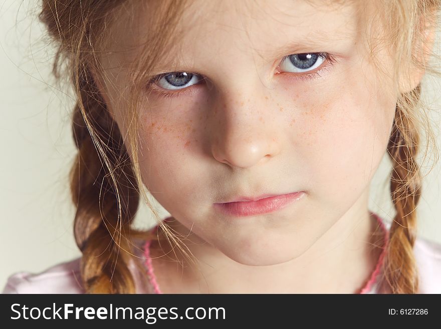 Blond beautiful girl with two plaits. Blond beautiful girl with two plaits