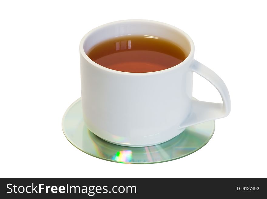 Cup of tea on CD, isolated on white background