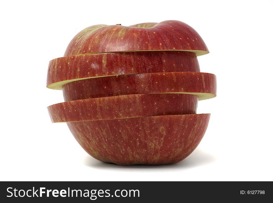 Sliced fresh red apple on white background.