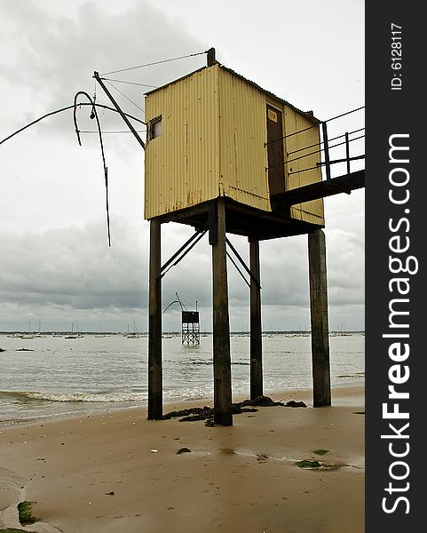 A classic oyster hut on a beach in Saint Nazaire, France