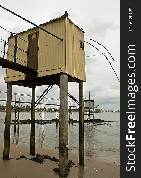 A classic oyster hut on a beach in Saint Nazaire, France. A classic oyster hut on a beach in Saint Nazaire, France