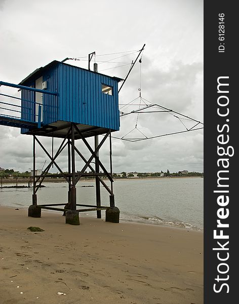 A classic oyster hut on a beach in Saint Nazaire, France. A classic oyster hut on a beach in Saint Nazaire, France