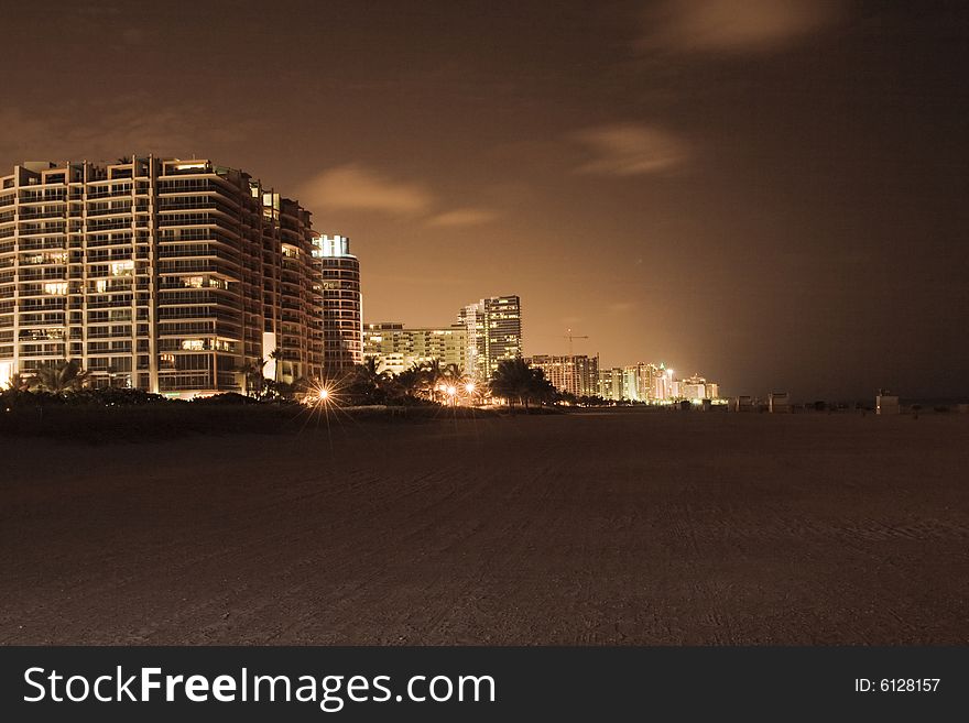 Houses on the beach by night