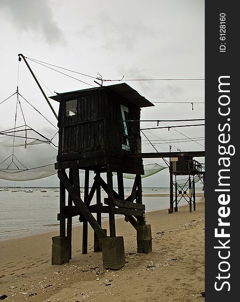 A classic oyster hut on a beach in Saint Nazaire, France. A classic oyster hut on a beach in Saint Nazaire, France