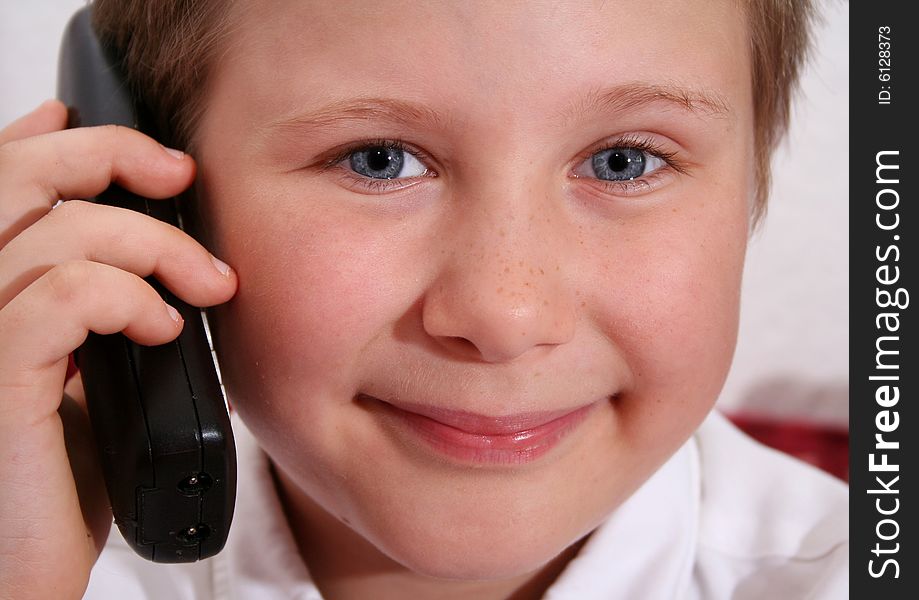 Young Boy On The Phone