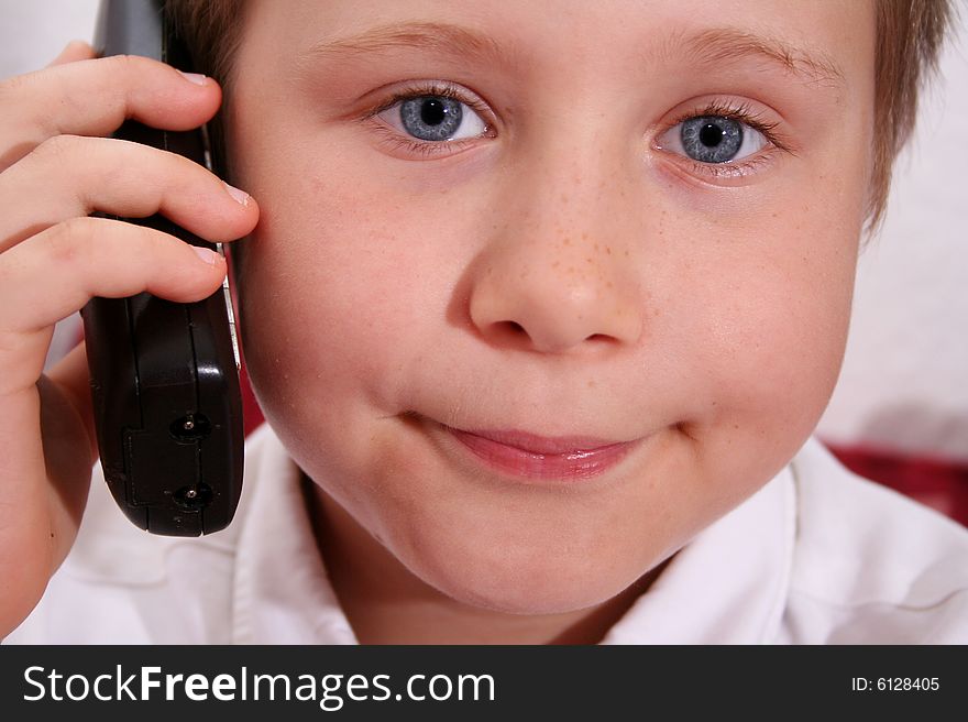 Young Boy On The Phone