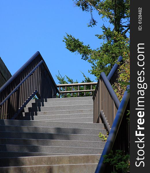 Stairway with railings climbing up to the sky. Stairway with railings climbing up to the sky.