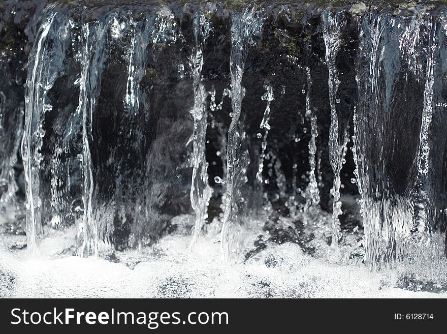 close up to small water cascade