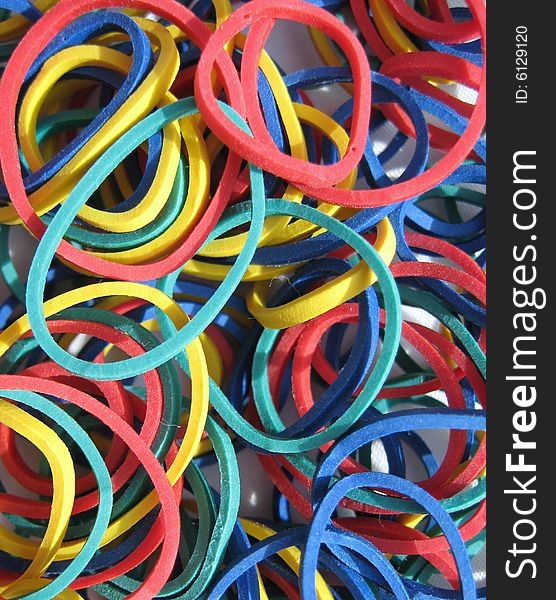 Primary colors rubber band background. Primary colors rubber band background