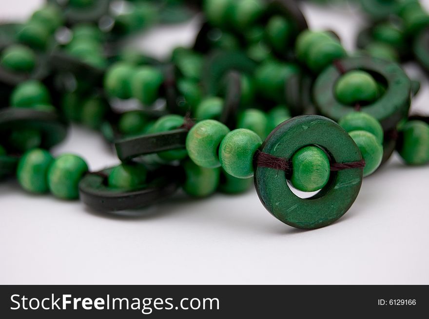 Green beads isolated on the white background