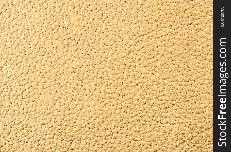 Natural qualitative beige leather texture. Close up. Natural qualitative beige leather texture. Close up.