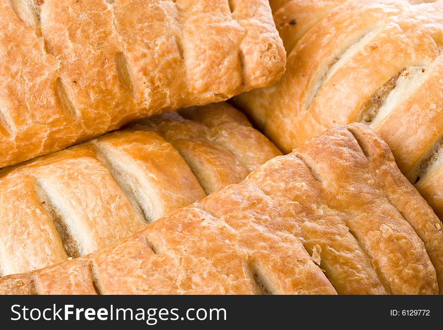 Abstract background from appetizing tasty fresh rolls