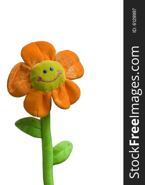 Smiling flower toy on white background