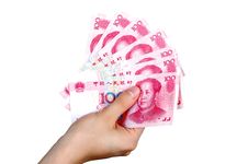 Holding Chinese Money Royalty Free Stock Photos