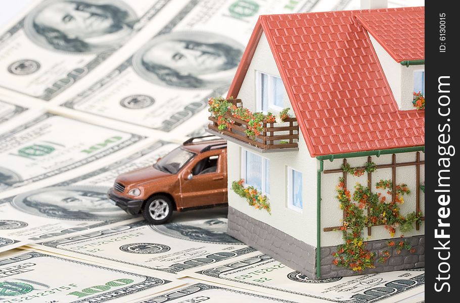 Miniature House and Money. Buying house concept