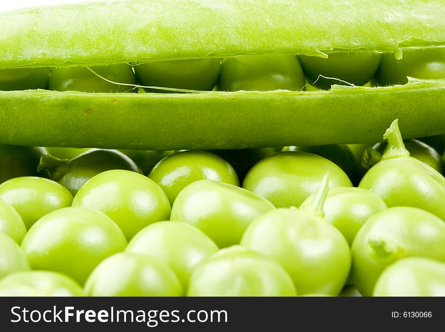 Fresh pods of peas on a white background. Fresh pods of peas on a white background