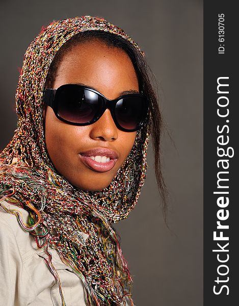 Portrait of yong trendy african female model with sunglasses. Portrait of yong trendy african female model with sunglasses