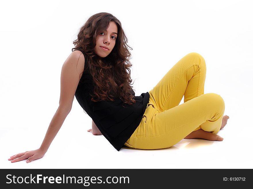 Young beautiful woman posing on white background