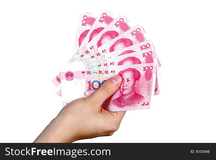 Hand holding Chinese money, RMB banknotes.