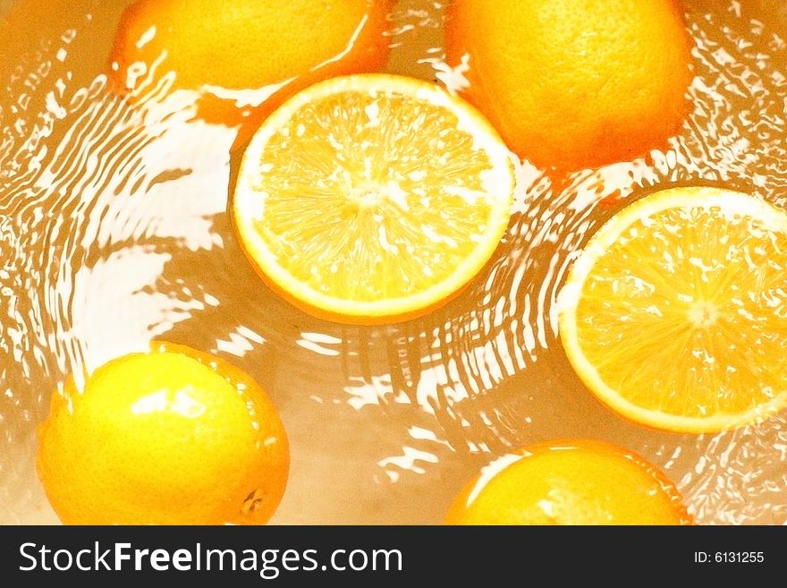 Fresh fruit oranges, - swim in juice, water. Fresh fruit oranges, - swim in juice, water.