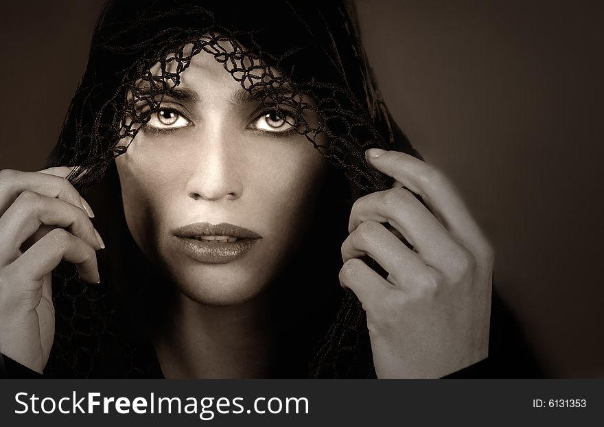 Beautiful portrait of a middle eastern woman with shawl