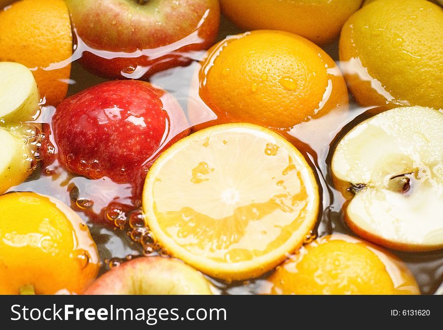 Wet fruit, apples, citrus