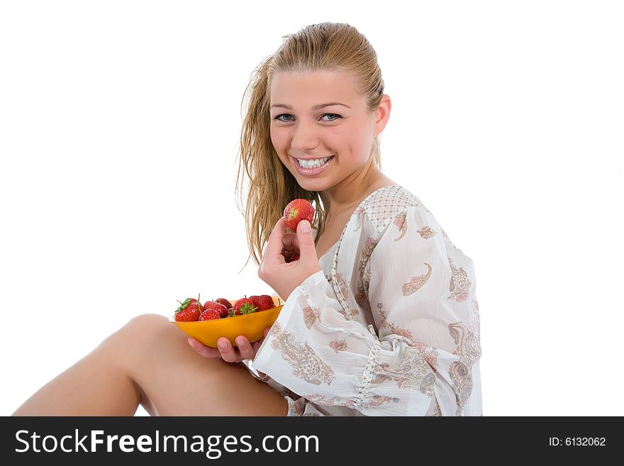 Beautiful girl with strawberry over white