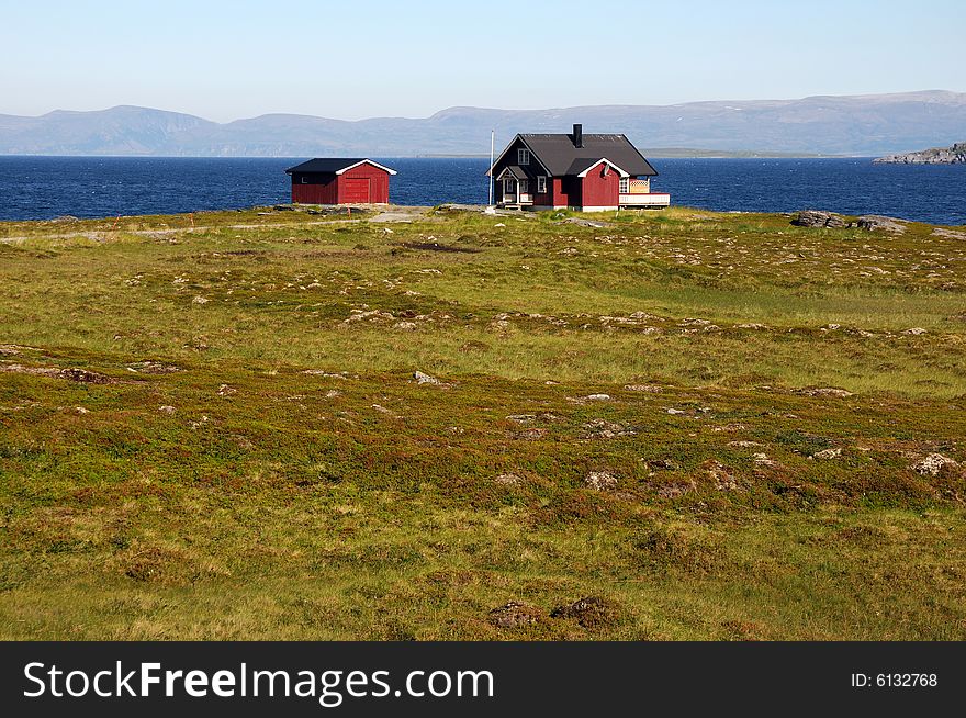 A lonely house at sea in a summer time