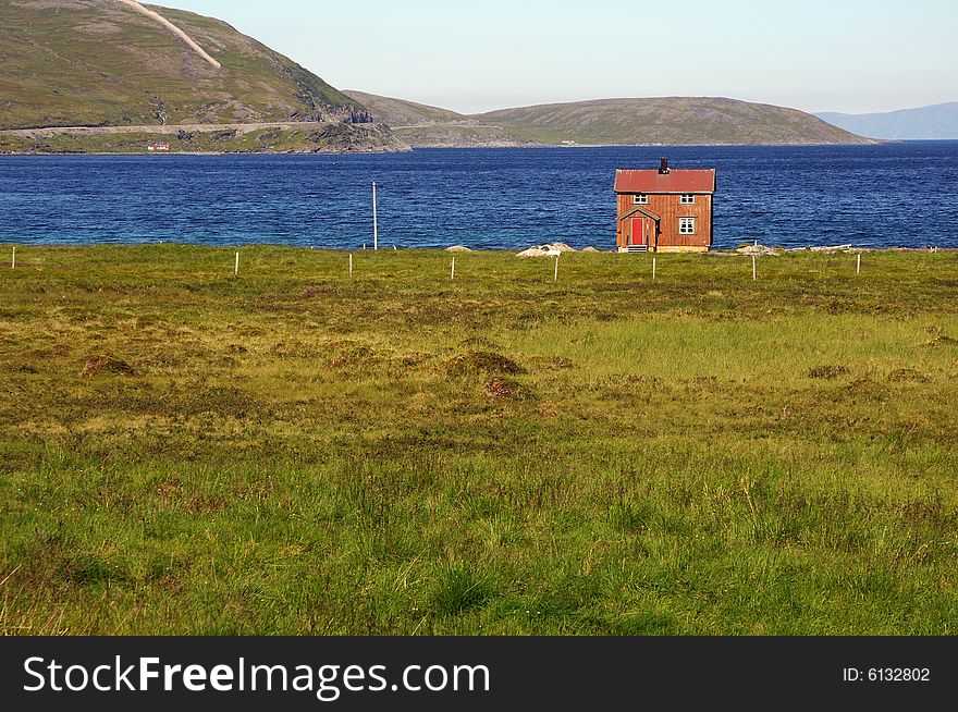 A lonely house at sea in a summer time