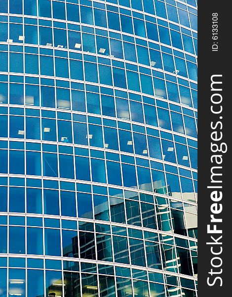 Reflections in windows of a beautiful modern skyscraper