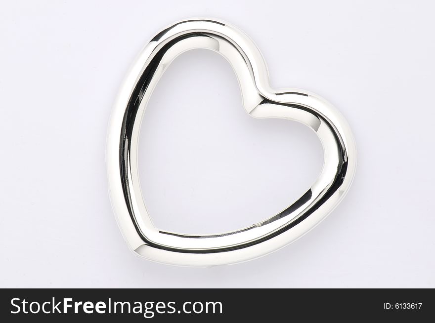 This picture shows a heart from silver. This picture shows a heart from silver