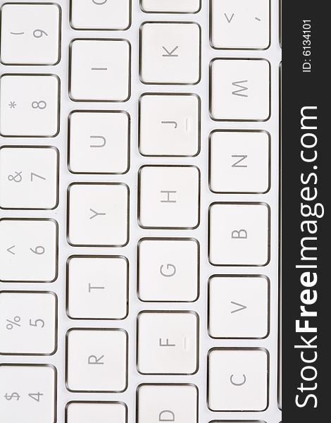 A white keyboard with letters and numbers.