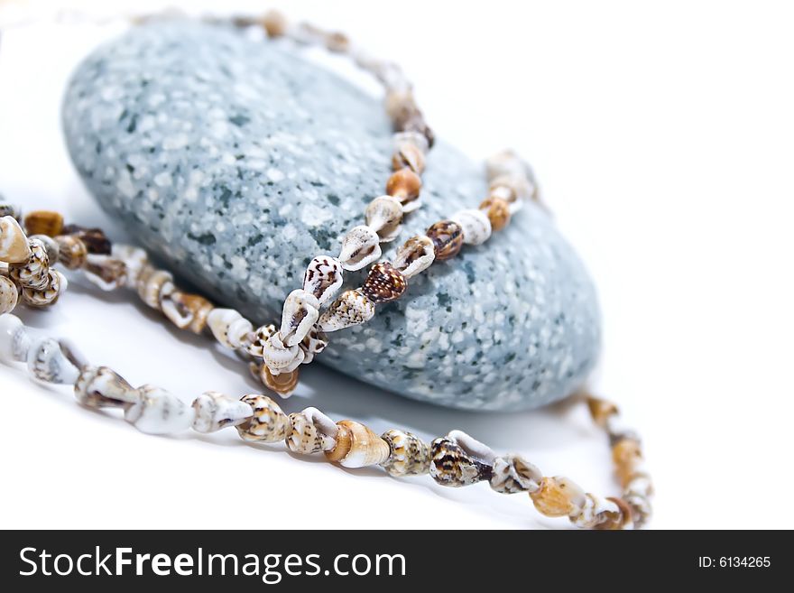 Stone, beads, small shells, backgrounds. Stone, beads, small shells, backgrounds
