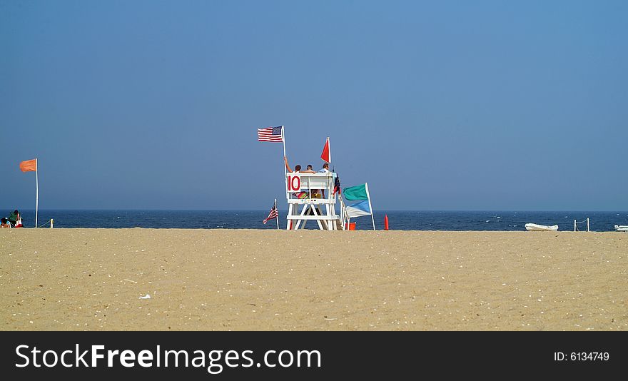 Lifeguard chair on beach with wide angle